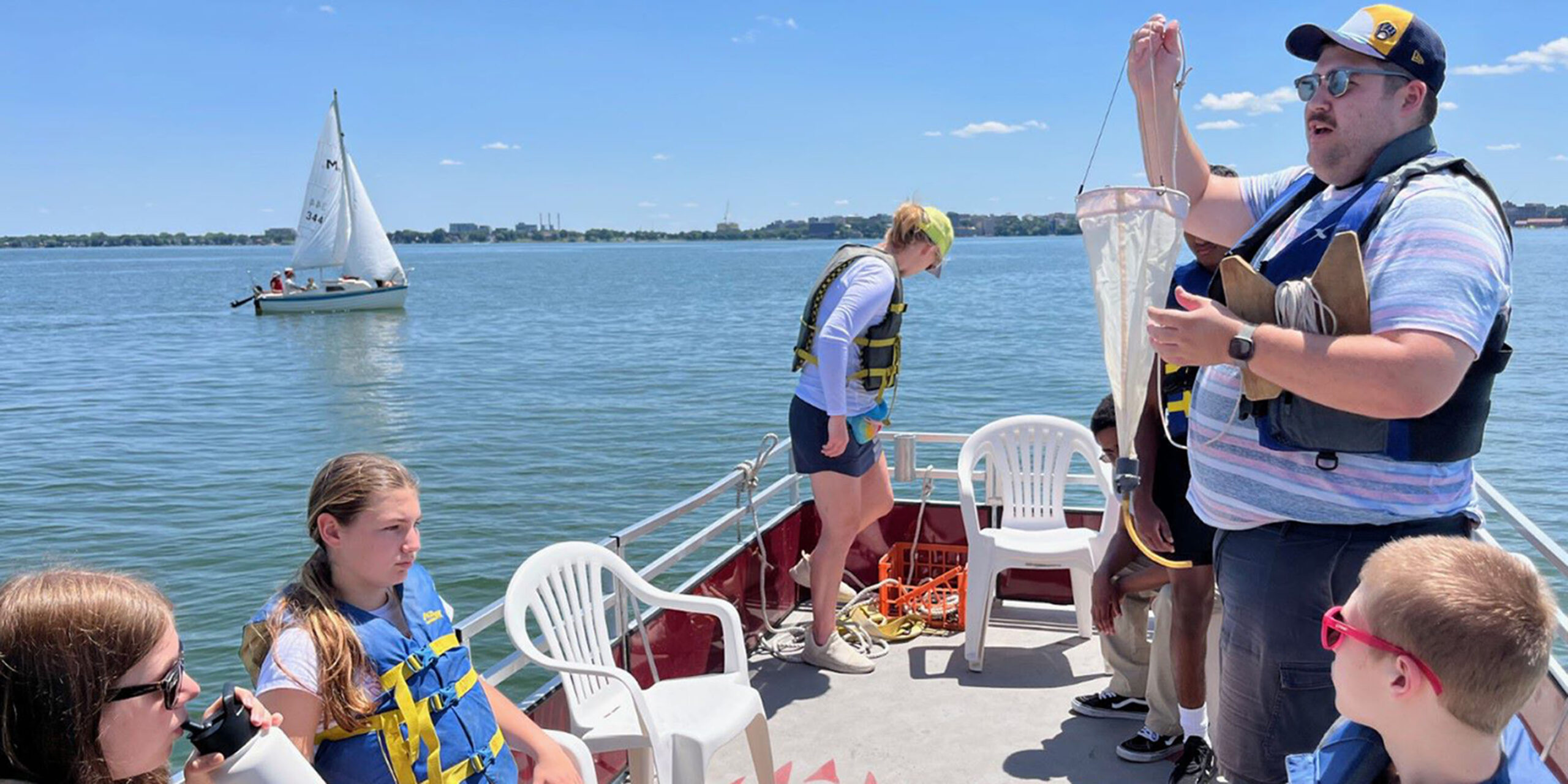 Students on Lake Mendota performing research