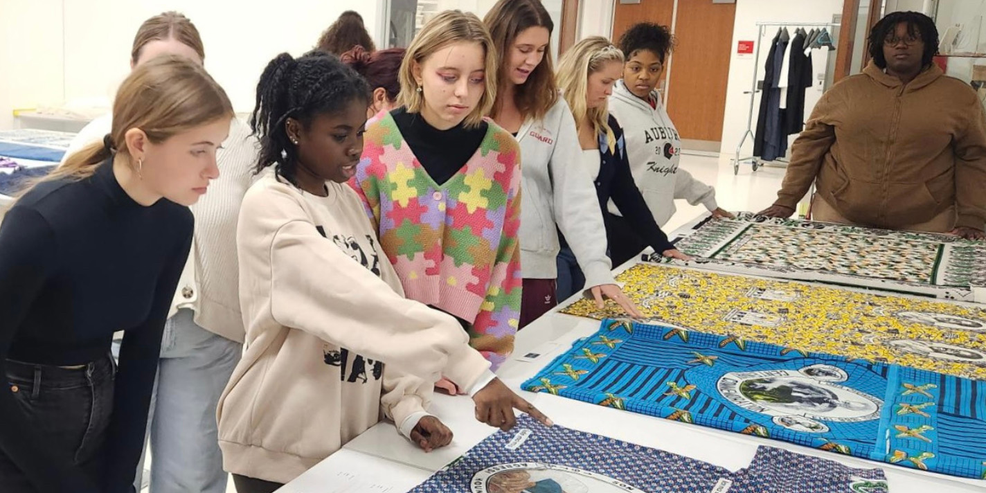 Students looking at textiles