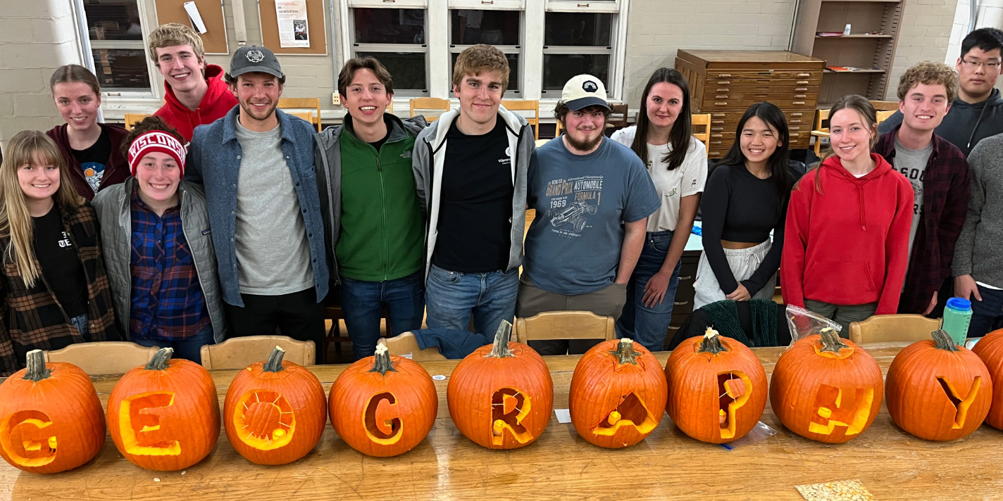 Geography students pictured with pumpkins