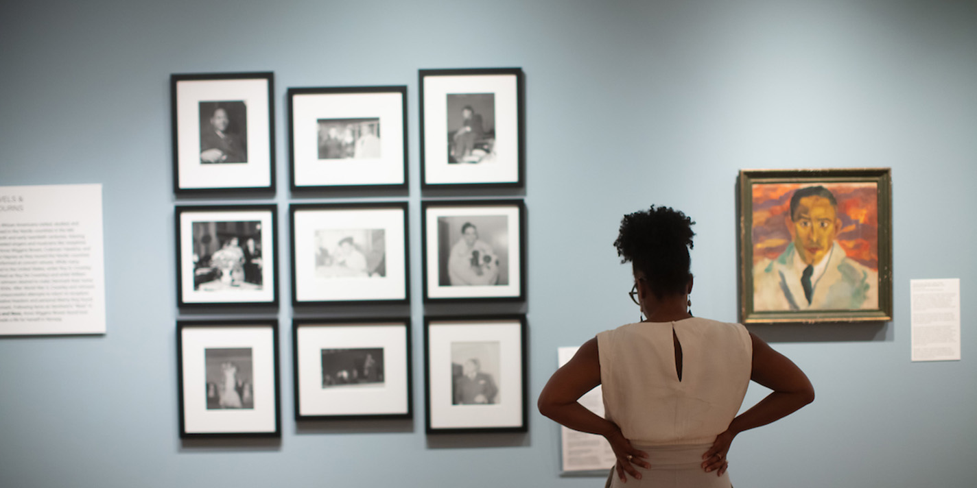 Person reading information about an exhibit